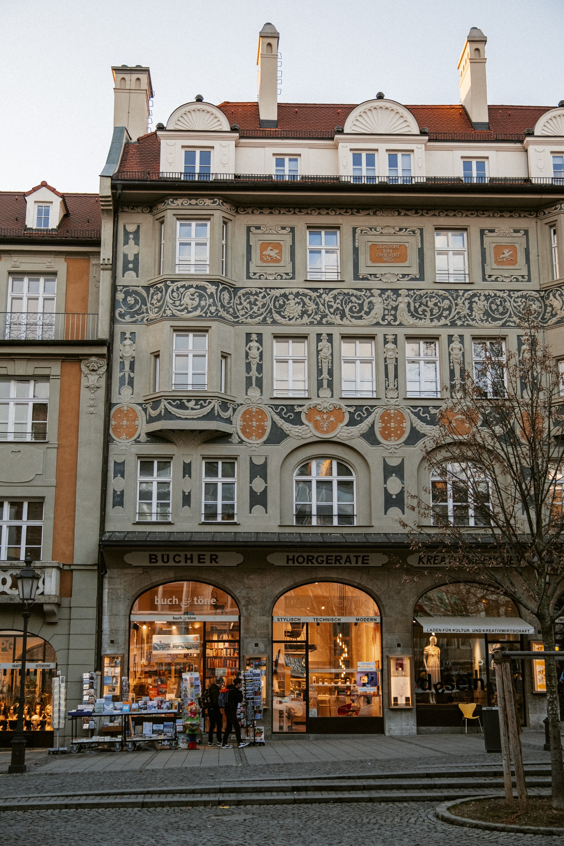 Stylized blue duotone portrait of a woman with long hair facing slightly backward